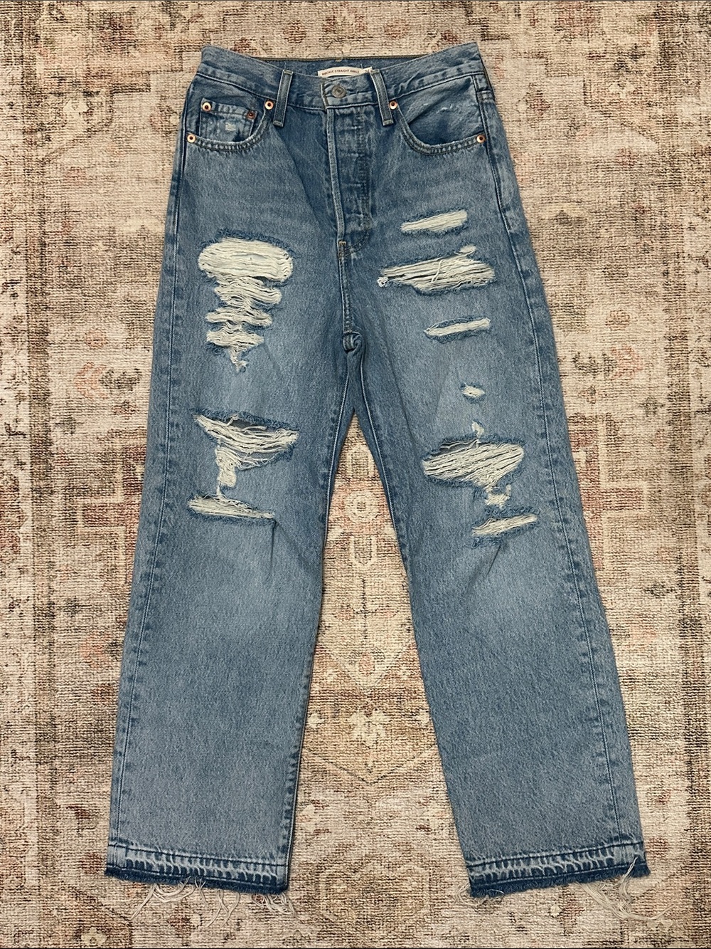 Woman’s Levi’s Destructed Ribcage Straight Leg